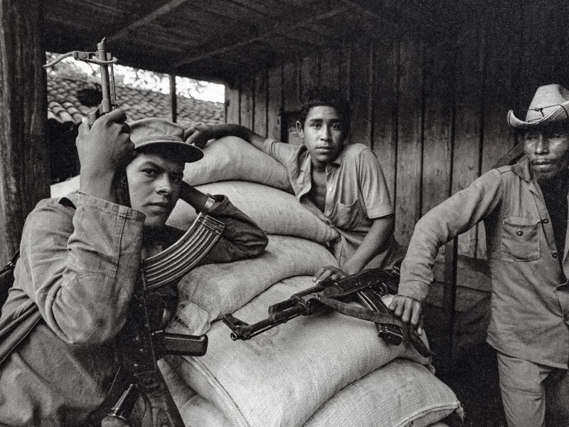 Members of a Sandinista "Auto-Defense" farming cooperative brandish AK-47s to defend against attacks by U.S.-backed Contra reblels, Esteli Department, Nicaragua. Photo by Scott Wallace/Getty Images