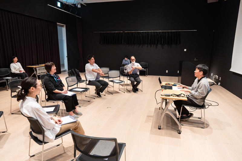 Engaging in a lively discussion.