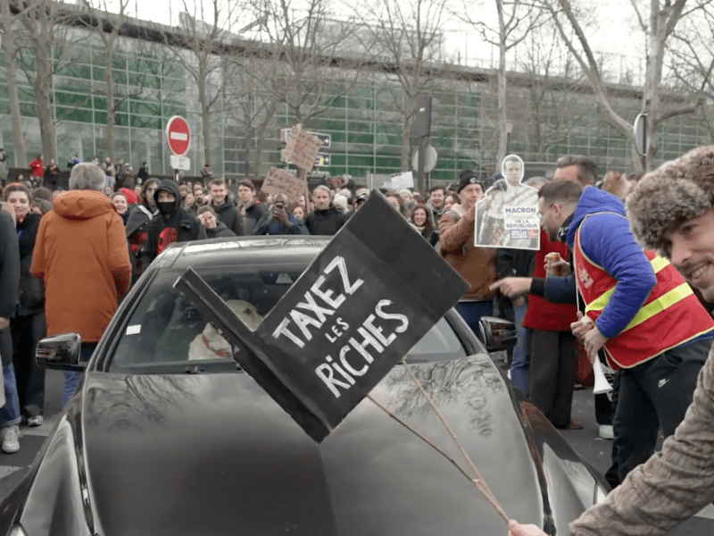 ‘We must make Macron back down’: French workers launch indefinite strike against pension reforms