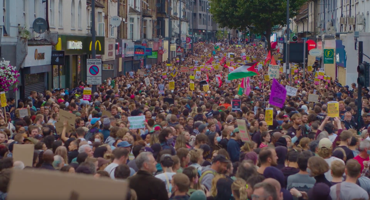 A massive crowd of anti-racist protesters gather on a London street to oppose the nationwide upsurge in violence by fascist gangs.
